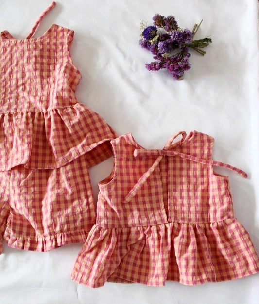 Conjunto top e calções